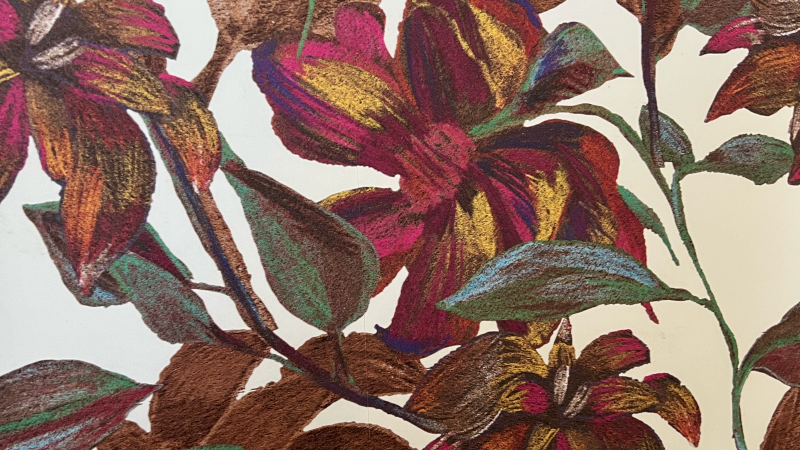 Colorful, textured floral artwork with leaves and flowers in reds, greens, and browns on a white background.