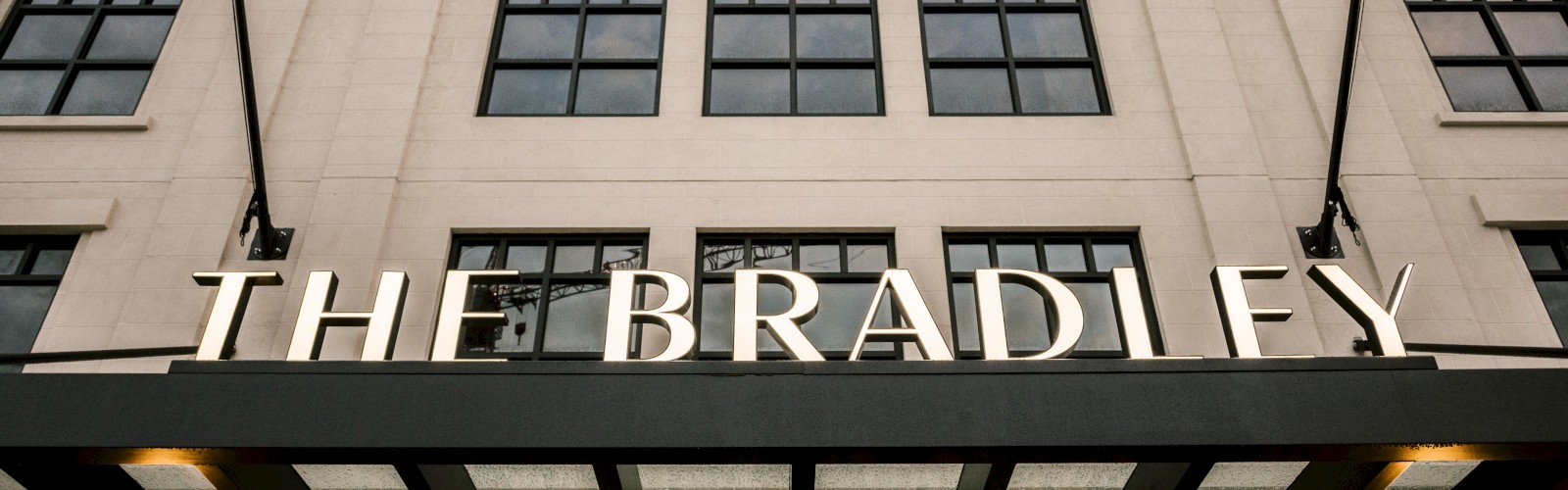 A building facade with the sign 